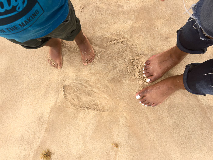 feet in sand at Elegushi Beach, Lekki, Lagos, Nigeria