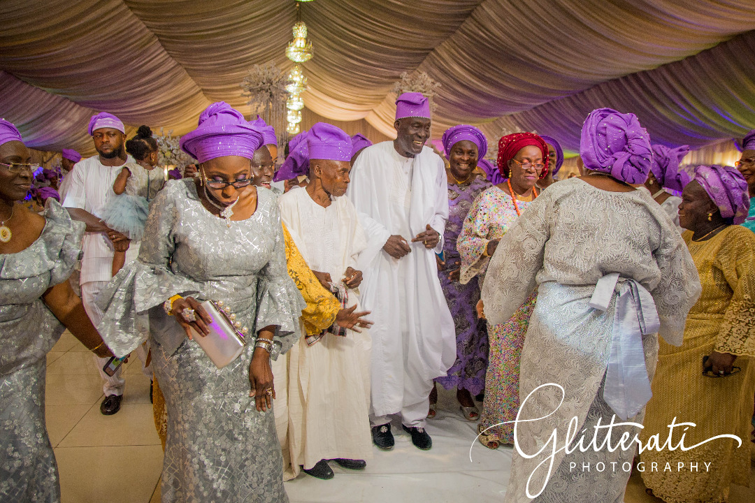 family celebrating at Yoruba wedding in Ikeja, Lagos, Nigeria