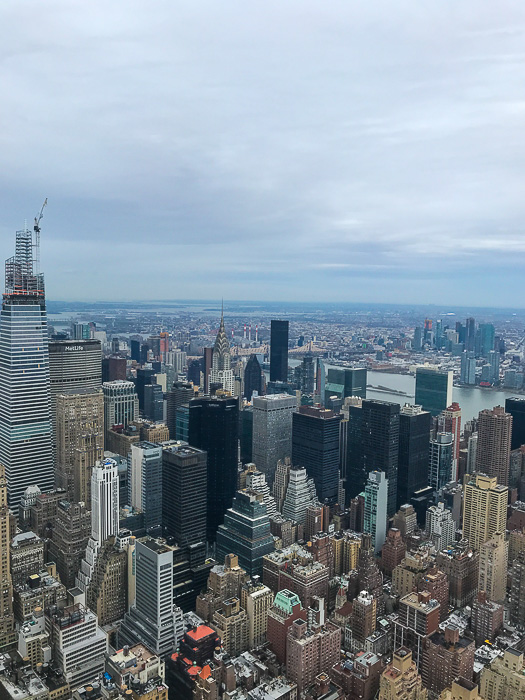 view of NYC skyline from Empire State Building 86th floor observation deck