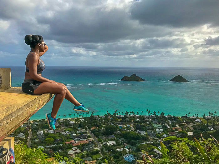 Jazzmine perched on ledge on Lanikai Pillbox overlooking ocean