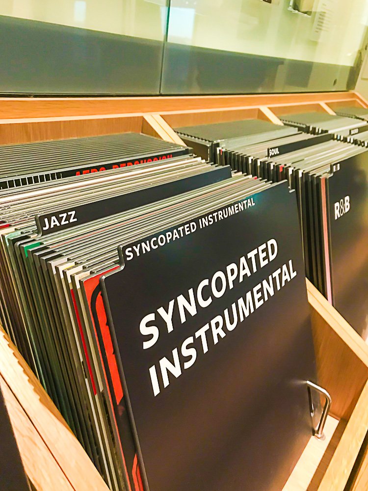 selection of Black musical records in a display at National Museum of African American Culture and History in DC.