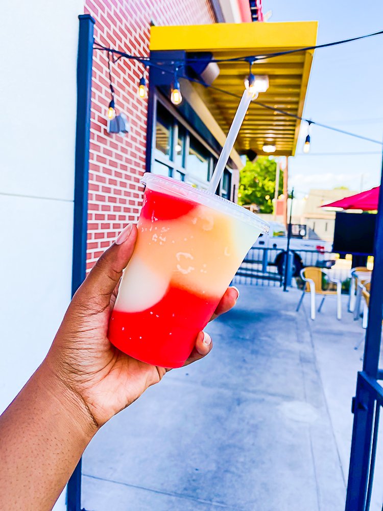 holding up MacGregor daiquiri from LA Burger in Third Ward.