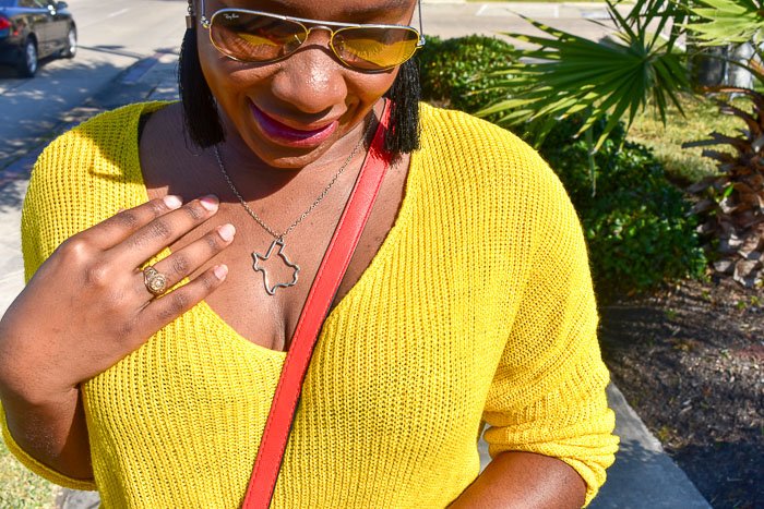 Closeup of Texas-shaped necklace pendant.