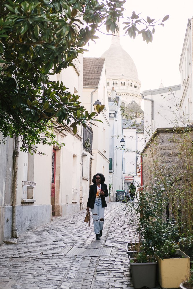 Jazzmine walking down street in Paris.