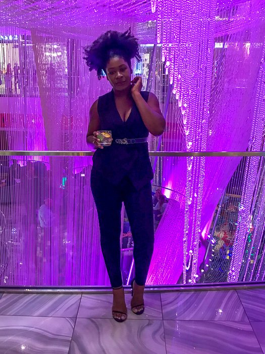 wearing all-black Vegas dinner outfit at Chandelier Bar.