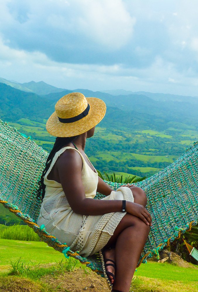 looking out at mountain view from hammock.