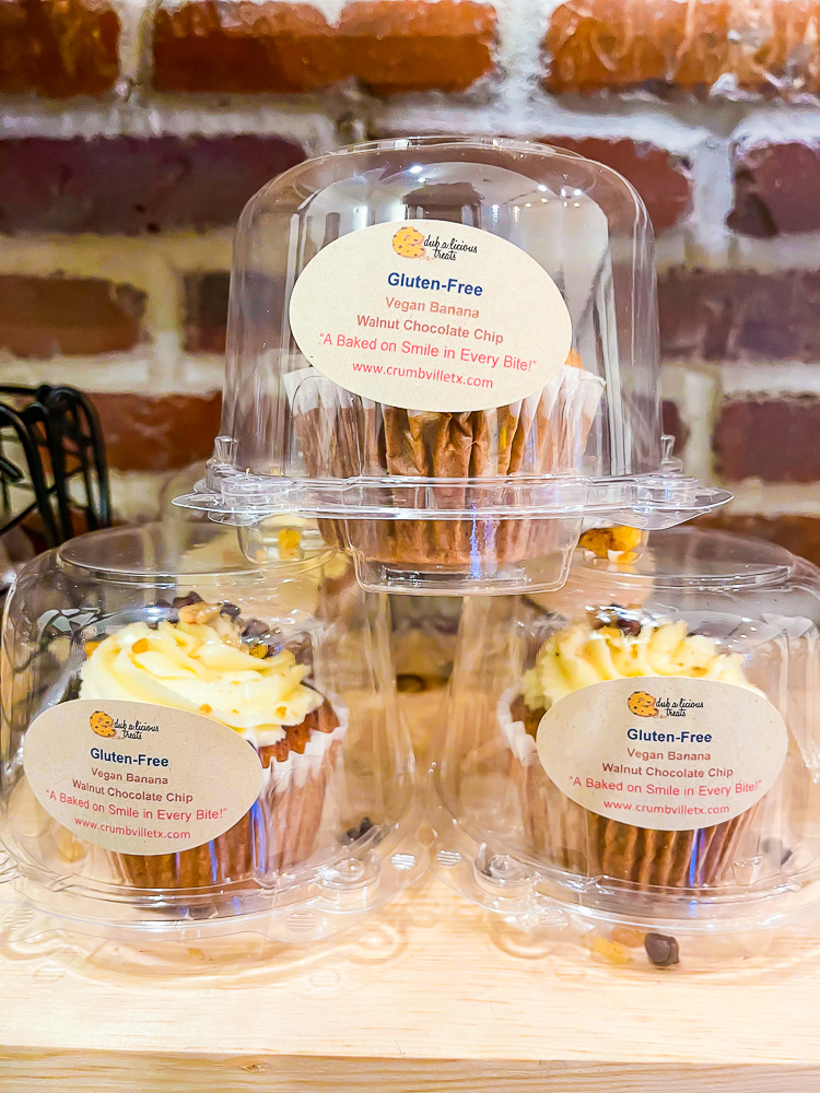 stack of vegan cupcakes at Crumbville, Texas bakery.