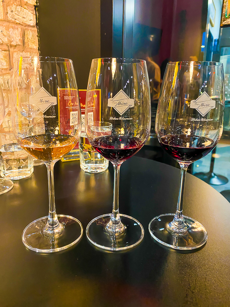 Tasting flight of wine glasses at Pur Noire winery in downtown Houston, Texas.