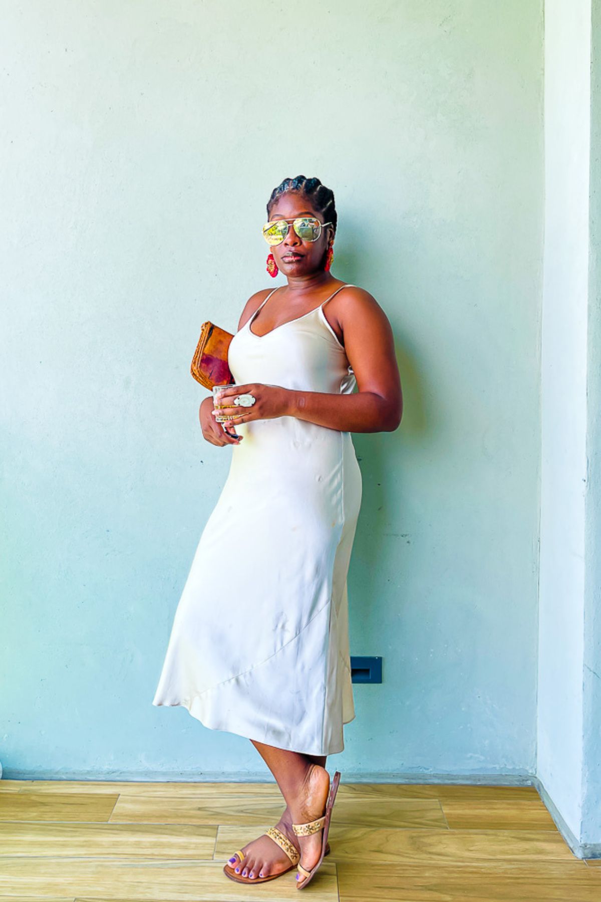 Jazzmine wearing a simple champagne-colored slip dress in Grand Cayman, West Indies.