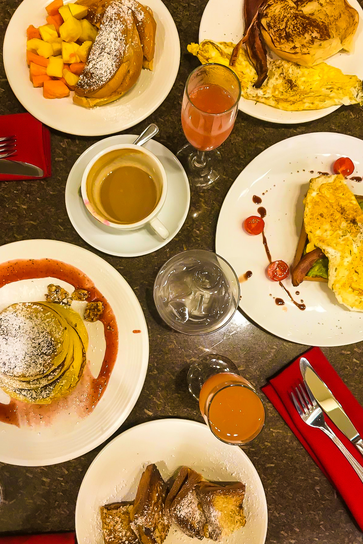 brunch spread at popular Old San Juan restaurant, Chocobar Cortes, included pancakes, cafecito, mimosas, chocolate grilled cheese, and omelettes.