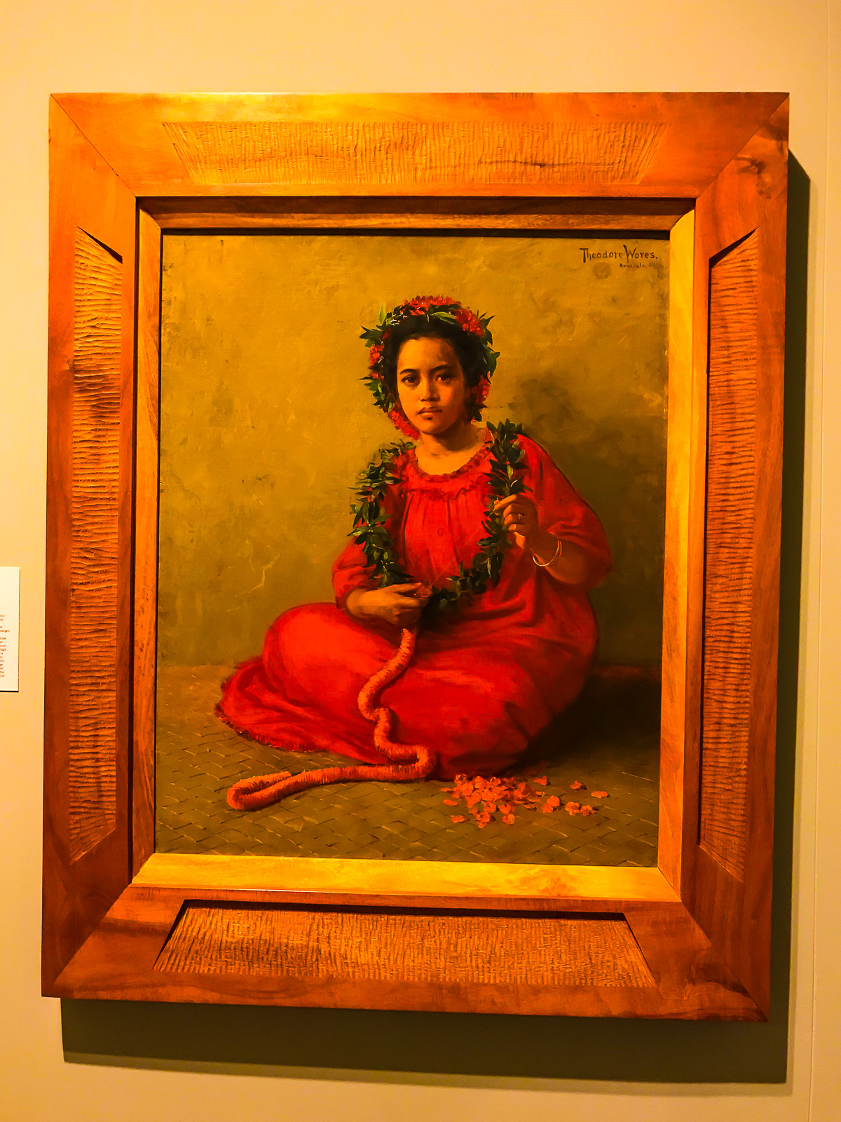 painting of a native Hawaiian girl making a lei on exhibit at the Honolulu Museum of Art.