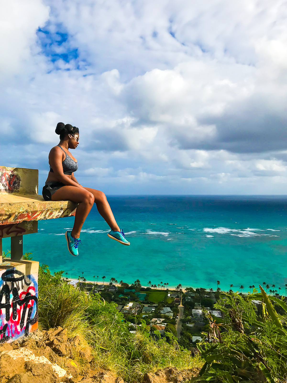 Jazzmine perched on Lanikai Pillbox looking down at Lanikai Beach.