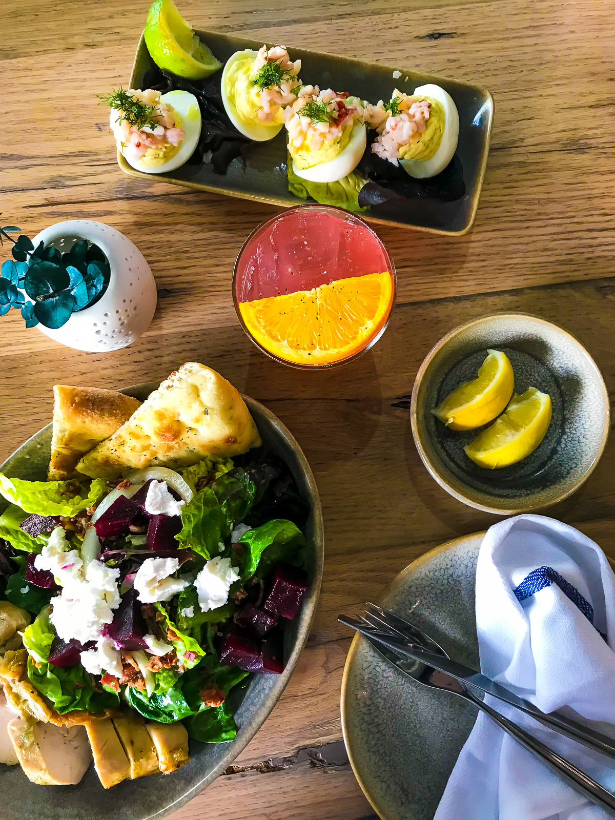 spread with fresh beet and chicken salad, mezcal Pauahi cocktail, and lobster deviled eggs at MoKu Kitchen in Oau's Kaka'ako neighborhood.