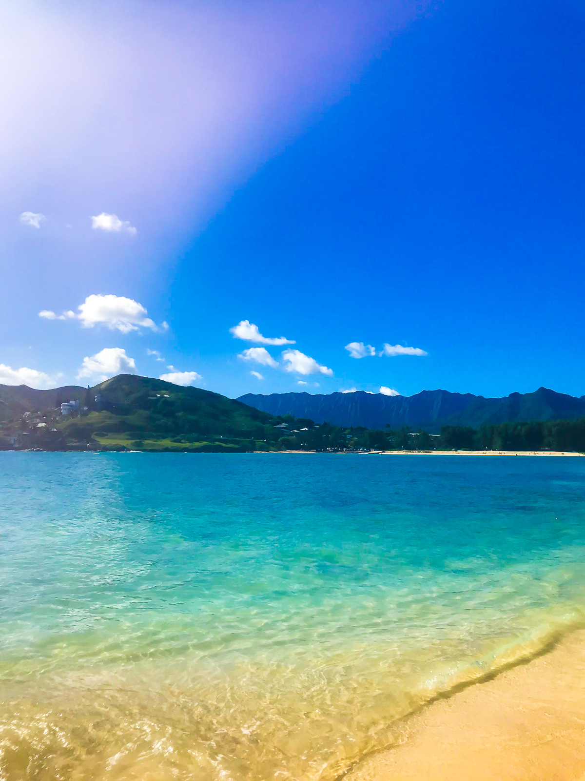 beautiful clear turquoise-colored water at Lanikai Beach on Oahu.