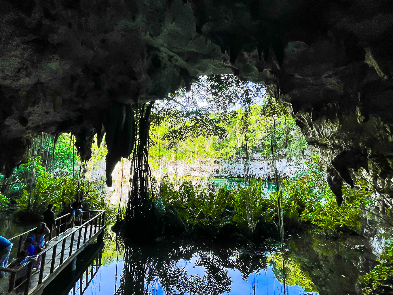 dock leading up to outdoor laguna at Los Tres Ojos Parque Nacional, RD.
