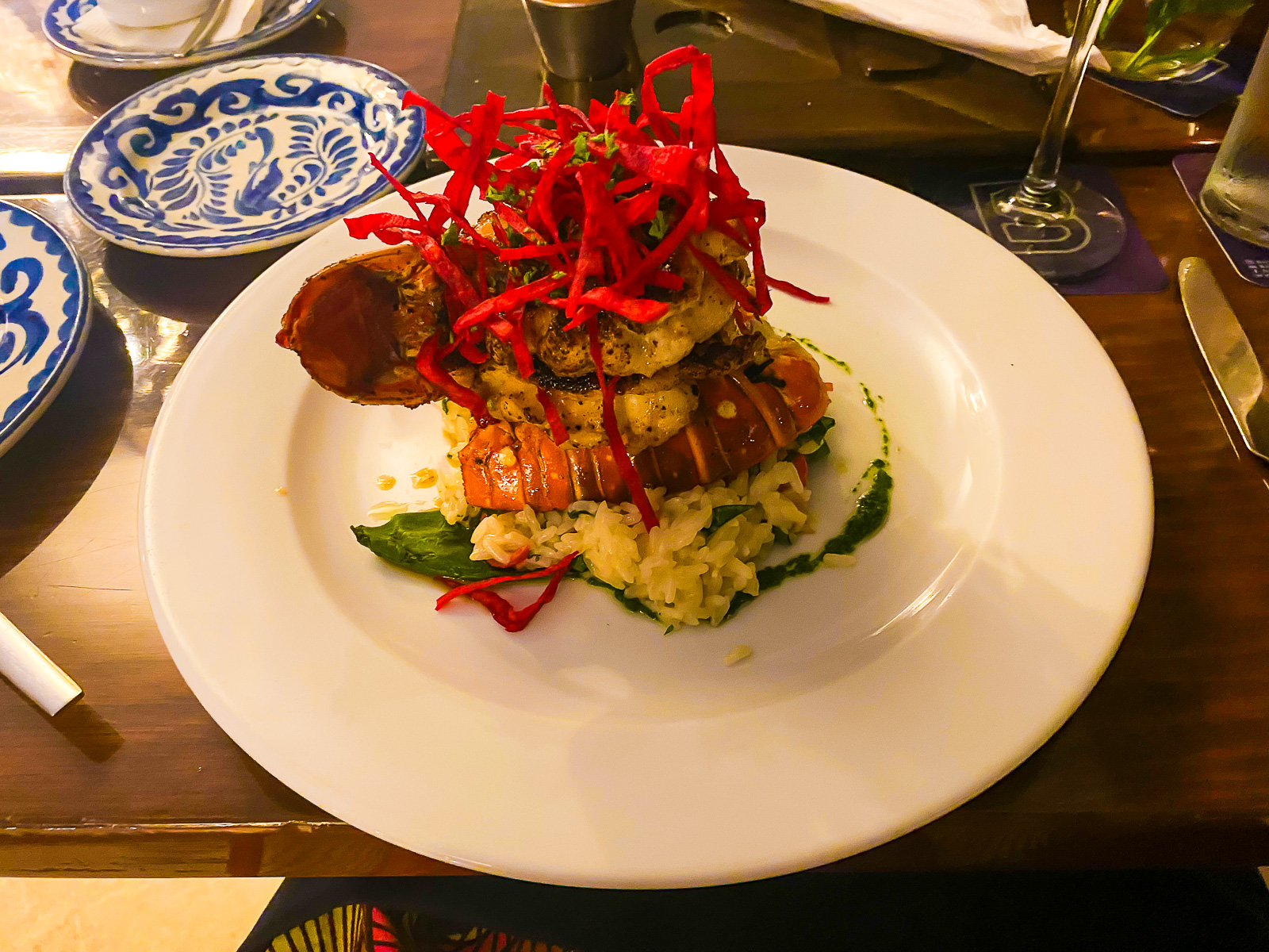 Caribbean lobster tail dinner plate at Buccano's at Night on Cozumel Island.