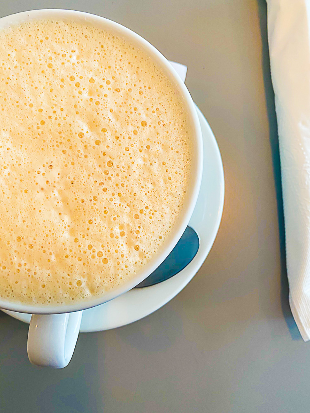 giant ceramic mug of foamy chai at Mexican cafe Sucre y Sale.