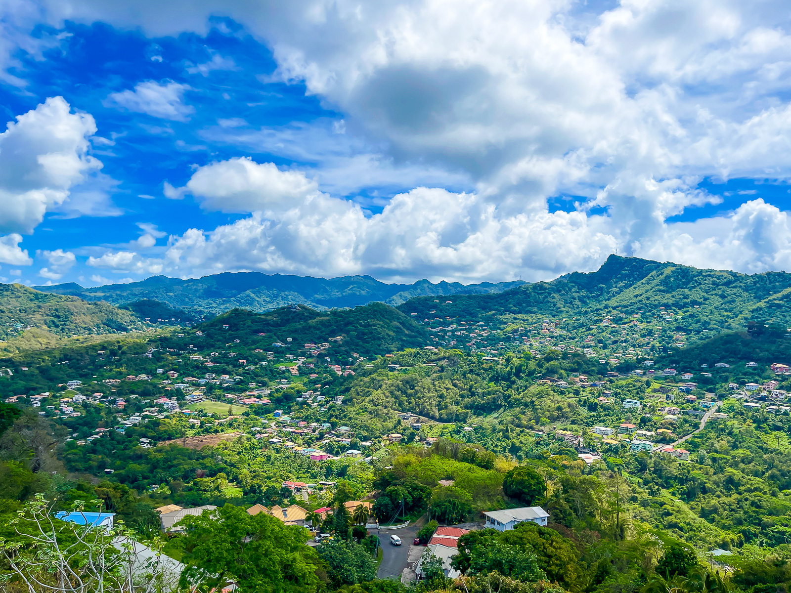 sweeping view of lush hillsides from Fort Frederick in St. George, Grenada island.