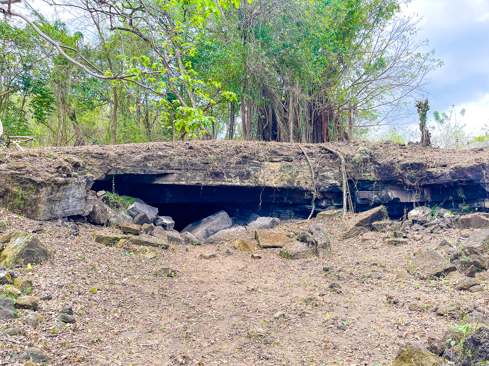 mouth of Black Bay Cave, home to indigenous petroglyphs, in the Isle of Spice, aka, Grenada.
