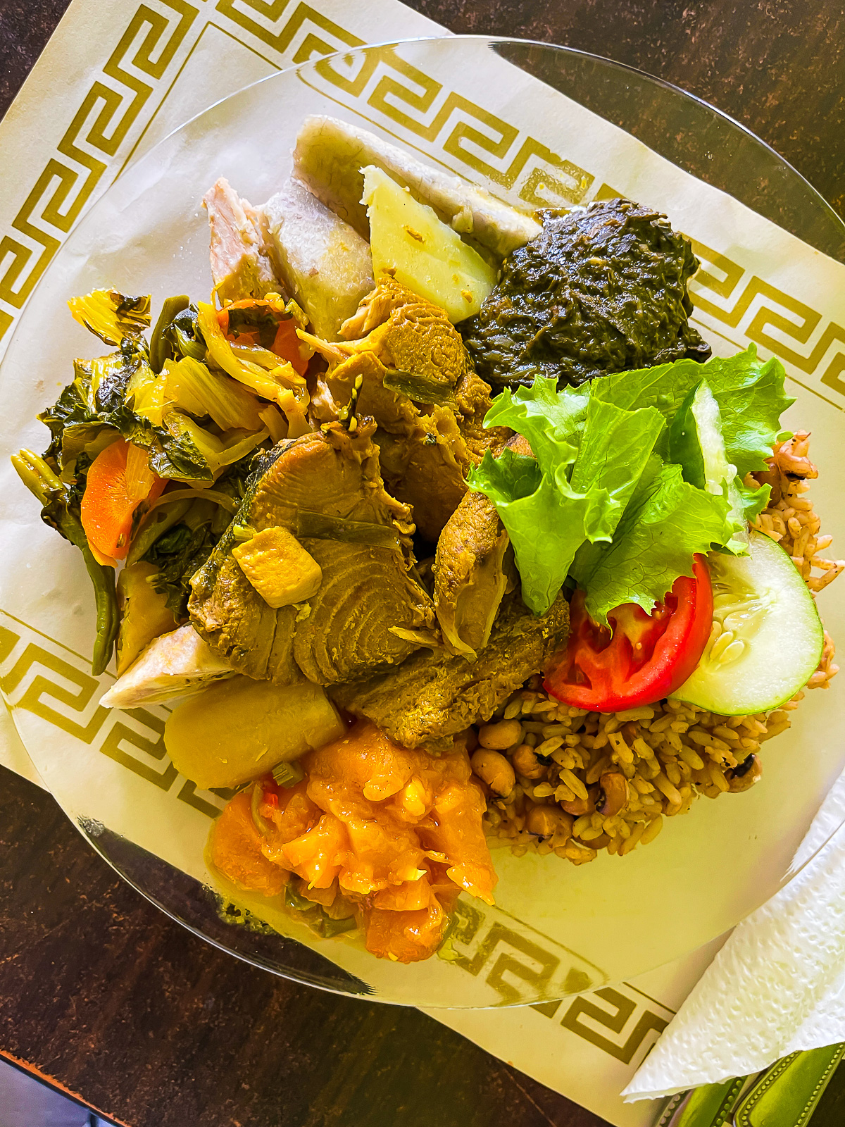 Grenadian local lunch plate at Kelly's Hot Spot in Gouyave, Grenada.