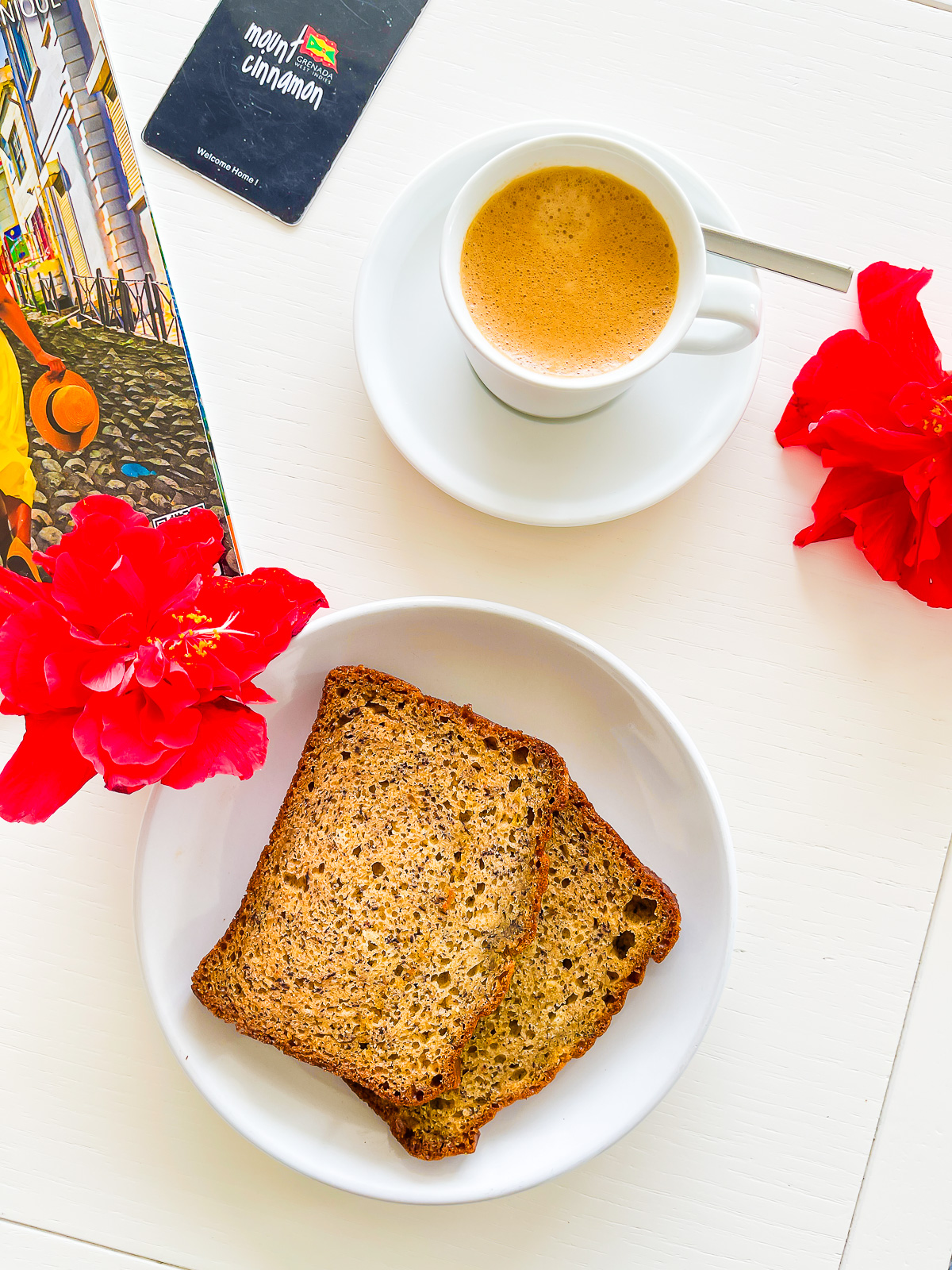 banana bread, espresso, and Mount Cinnamon key card on table.