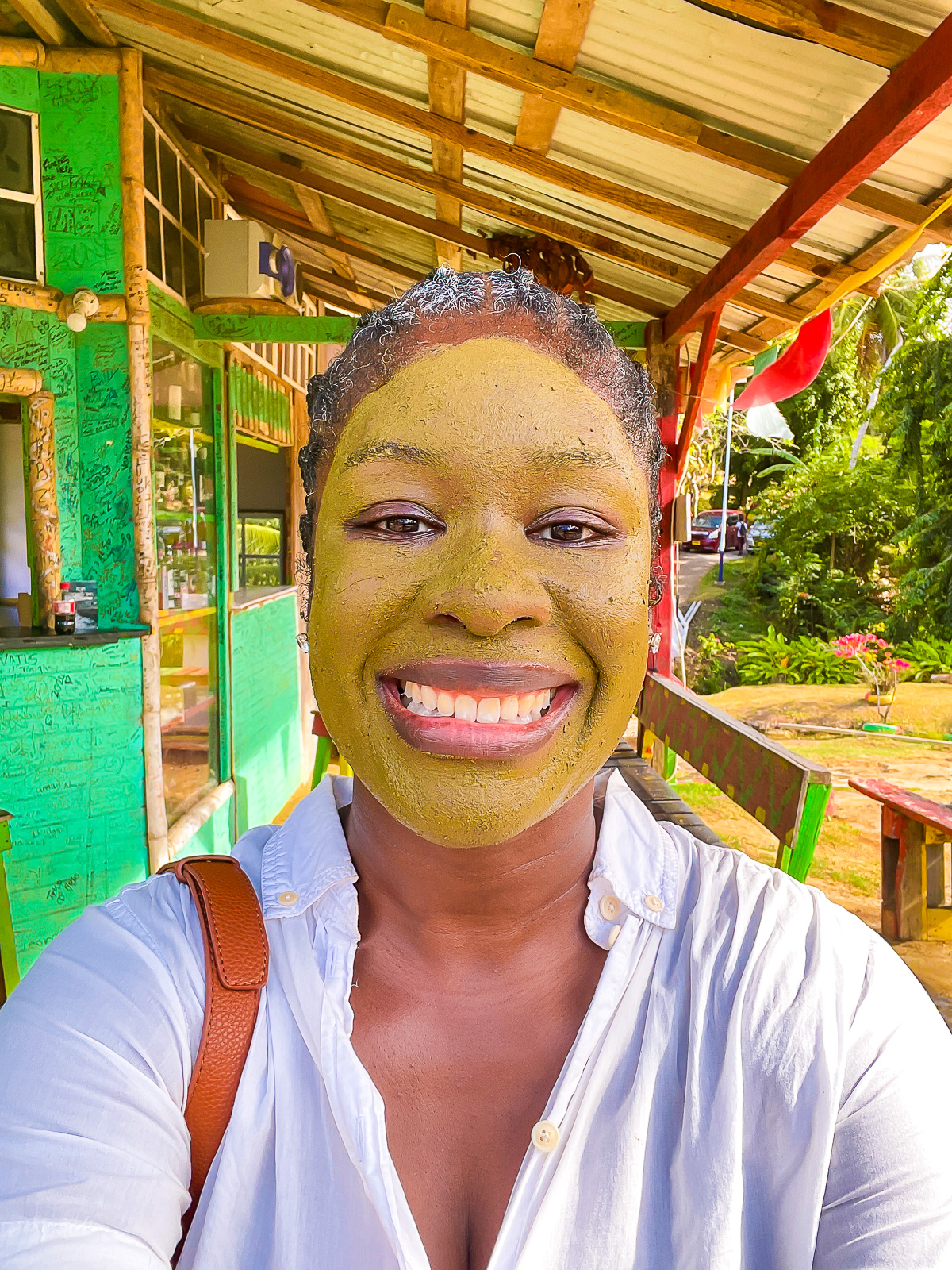 Jazzmine with her face coated in sulphuric clay mask at Grenada's River Sallee Boiling Springs.