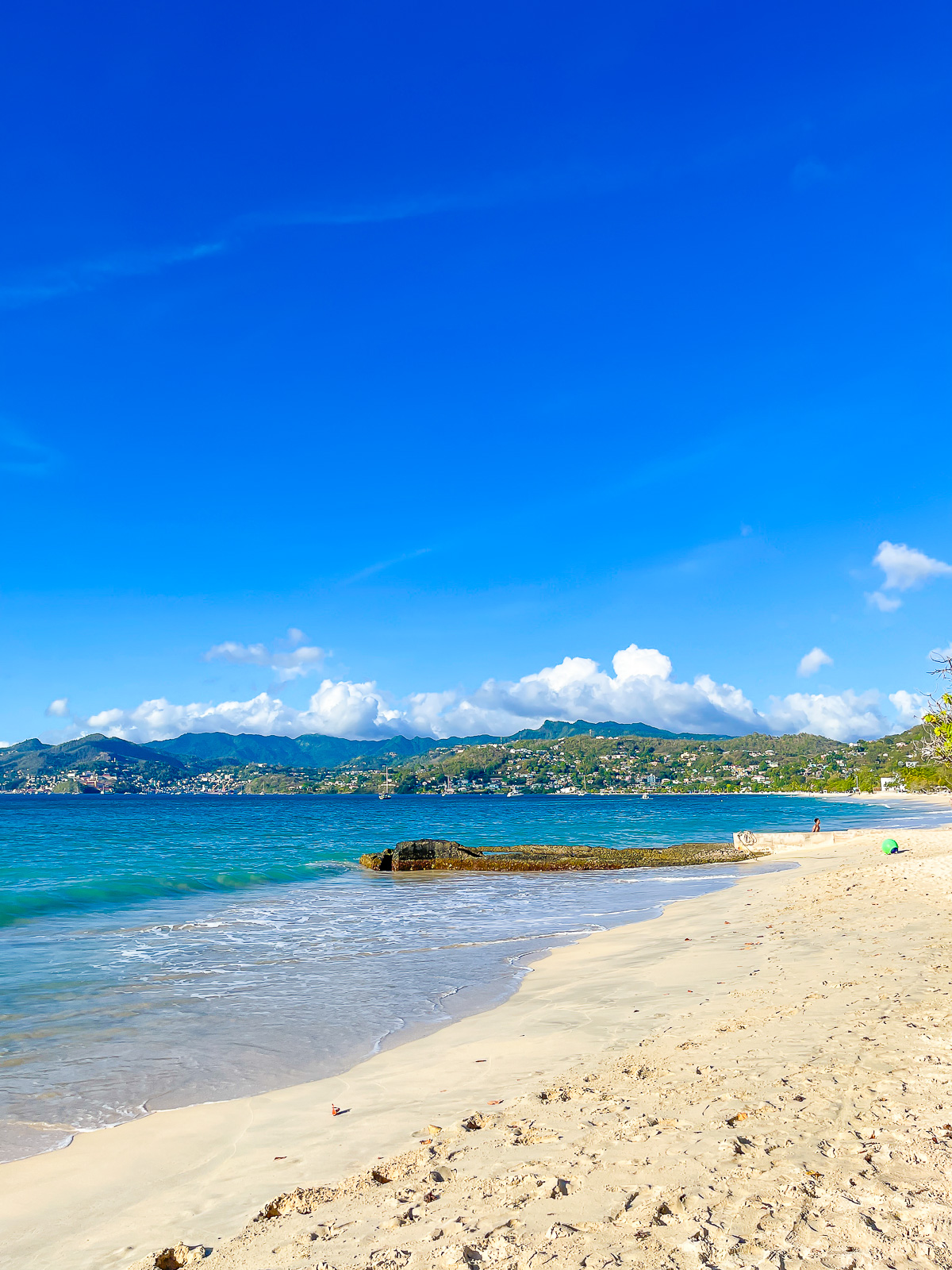 The world-famous white sands and calm blue waters of Grand Anse Beach in Grenada, aka, the Isle of Spice.